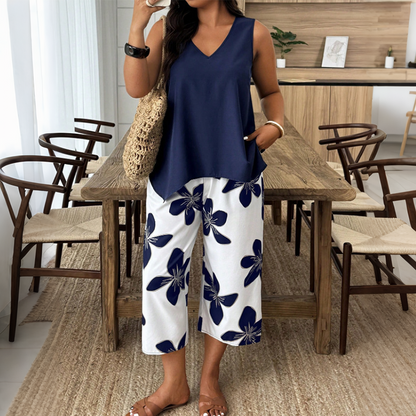 🌸 50% OFF! ✨ Women's Asymmetrical Top & Floral Print Capri Pants Set – Versatile, Vibrant, Comfortable 🌺